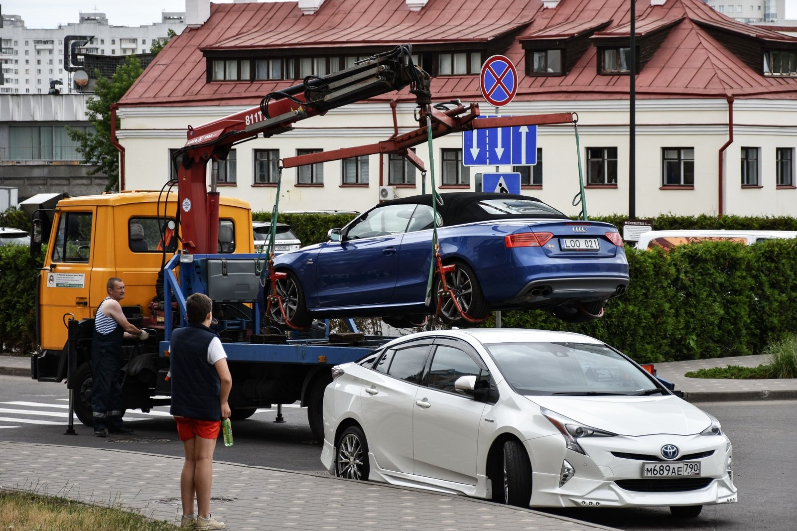 Tow truck transporting a car